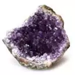 Natural amethyst geode weighing approximately 1 pound — deep purple sparkling crystal cluster showing geological formation and natural color variation.
