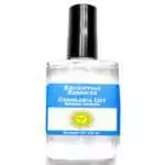 Casablanca Lily Escential Essences fragrance oil ½ oz roll-on by Auric Blends — glass bottle with white lily floral label on white background.