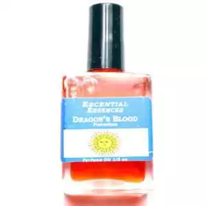 Dragon's Blood Escential Essences fragrance oil ½ oz roll-on by Auric Blends — glass bottle with bold dragon label on white background.