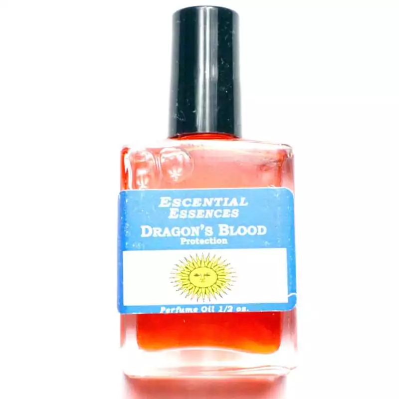 12oz-Dragonaposs-Blood-escential-essences-oil-OMDRA Dragon's Blood Escential Essences fragrance oil ½ oz roll-on by Auric Blends — glass bottle with bold dragon label on white background.