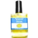 Nirvana Escential Essences fragrance oil ½ oz roll-on by Auric Blends — glass bottle with serene spiritual label on white background.