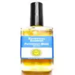 Patchouli Musk Escential Essences fragrance oil ½ oz roll-on by Auric Blends — glass bottle with earthy dark label on white background.