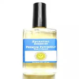 Premium Patchouli Escential Essences fragrance oil ½ oz roll-on by Auric Blends — glass bottle with earthy botanical label on white background.