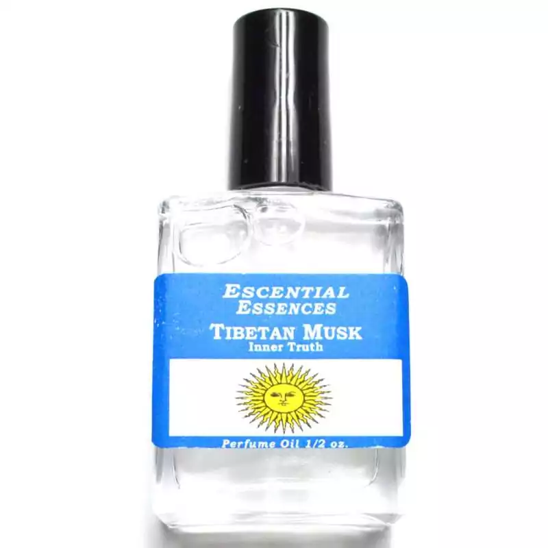 Tibetan Musk Escential Essences perfume oil ½ oz roll-on by Auric Blends — glass bottle with earthy-toned label on white background.