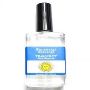 Tranquility Escential Essences fragrance oil ½ oz roll-on by Auric Blends — small glass bottle with calming label design on white background.