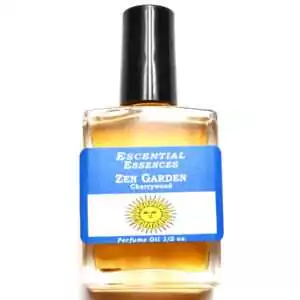Zen Garden Escential Essences fragrance oil ½ oz roll-on by Auric Blends — glass roll-on bottle with green and white label on white background.