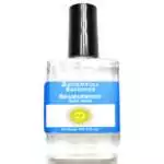 Shamanwood fragrance oil half oz — clear glass bottle with black cap, Escential Essences Shamanwood Spirit Guide label with sun graphic.