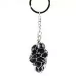 Black obsidian wire bag keychain — natural black obsidian pine-cone shaped crystal in silver wire mesh with keychain ring for portable protection.