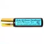 Small 10ml amber glass bottle labeled Lady of Grace Prayer Oil, shown on a neutral background.