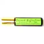 Small 10ml amber glass bottle labeled Sacred Reflection Prayer Oil placed on a plain background.