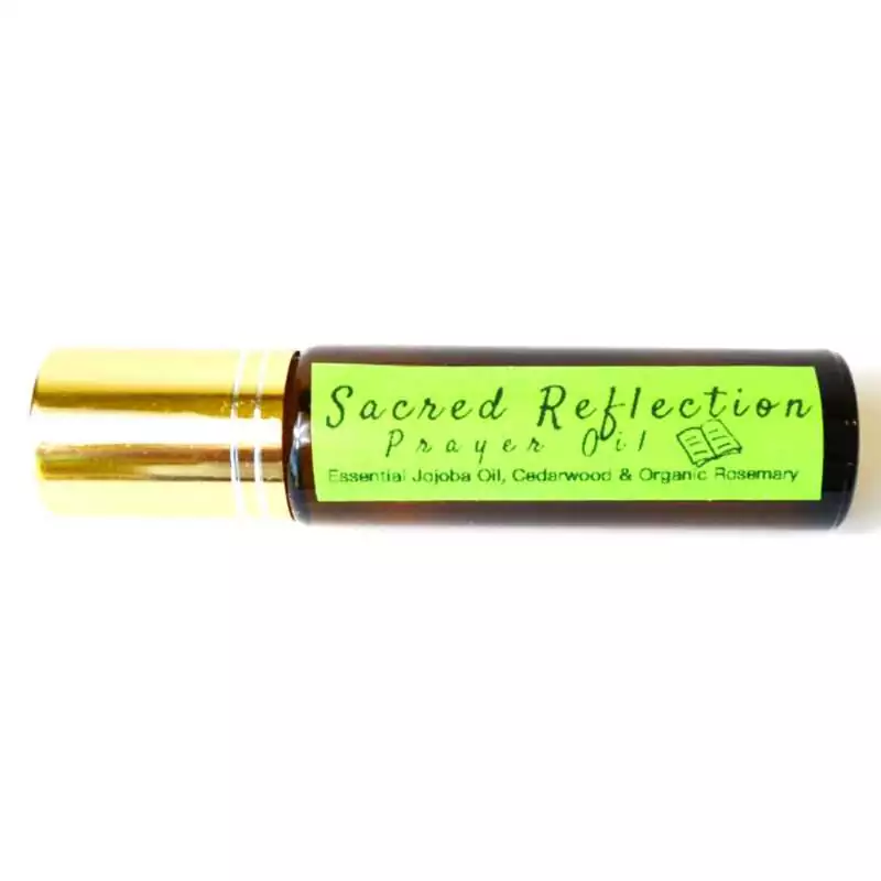 10ml-Sacred-Reflection-prayer-oil-O10SACR Small 10ml amber glass bottle labeled Sacred Reflection Prayer Oil placed on a plain background.