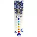 11.75-inch butterfly evil eye wall hanging with blue Nazar beads and colorful butterfly wing details on a white background