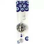 Wall hanging measuring 13.25 inches with a Buddha charm and hanging faceted crystal prisms that cast rainbow light, shown against plain background