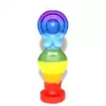 A 5.5-inch chakra goddess figure candle showing rainbow layered wax in red, orange, yellow, green, blue, indigo, and violet bands in a standing female silhouette