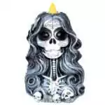 6-inch resin Santa Muerte backflow incense burner depicting a robed skeletal female figure with detailed folk art styling, showing backflow cone hole on a white background