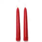 A pair of 7-inch light red taper candles standing upright, showing a soft rosy-red color with smooth wax finish and pointed tips