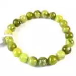 8mm Chinese jade beaded stretch bracelet with smooth round medium-green jade beads on elastic cord, shown on plain background