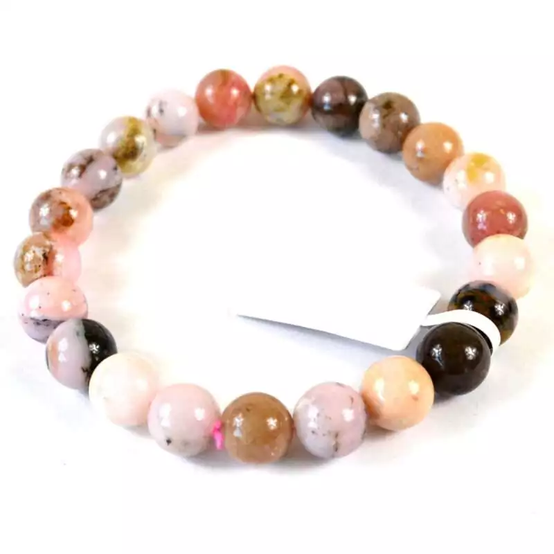 8mm pink opal beaded stretch bracelet with soft pastel-pink opaque round beads on elastic cord, shown on plain neutral background