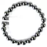 Eight millimeter terahertz silicon crystal beaded stretch bracelet with uniform dark metallic grey polished beads on a white background