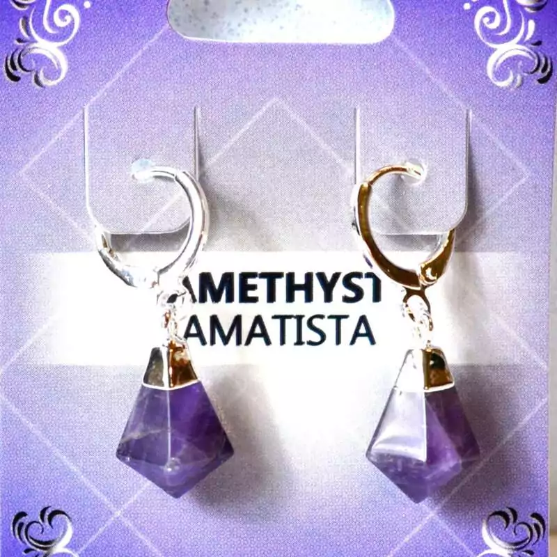 Amethyst-earrings-W-click-hoop-JE016 Pair of amethyst crystal stone drop earrings with silver-toned click hoop closures displayed on a white background