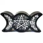 A black wax Triple Moon figure candle with waxing crescent, full circle, and waning crescent moon symbols embossed across the front face in deep black wax