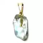 Blue topaz tumbled stone pendant in pale sky-blue hue, wire-wrapped and hanging on a thin cord necklace.
