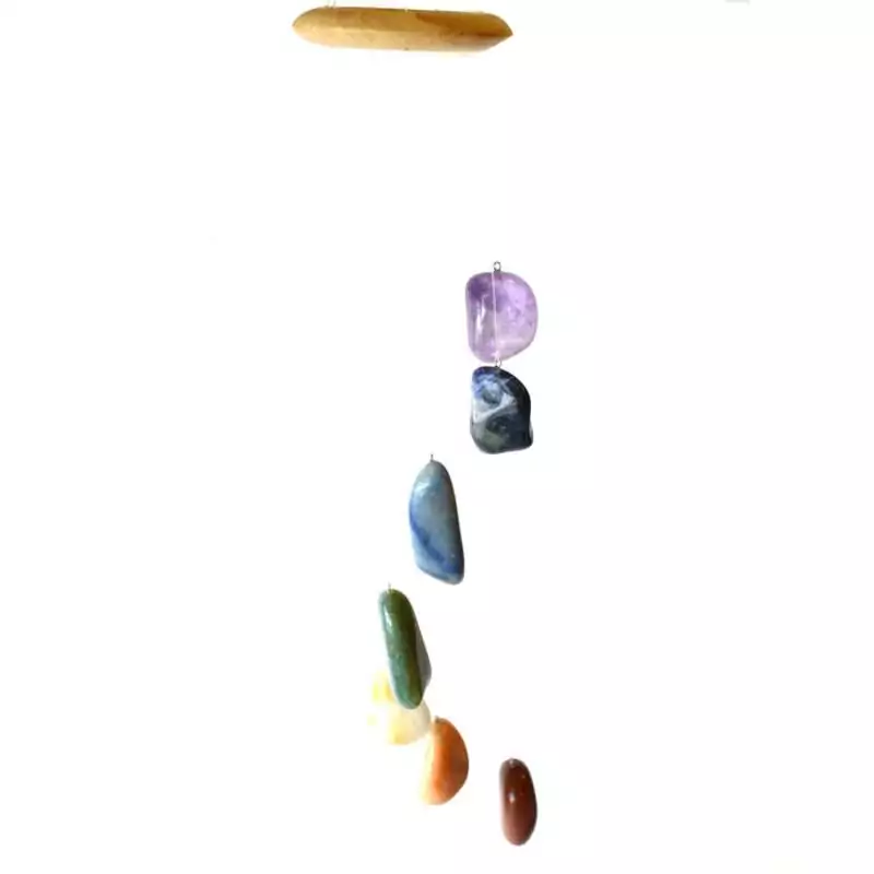 Wind chime with seven tumbled chakra crystal stones strung vertically on cord, showing seven distinct gemstone colours from red to violet