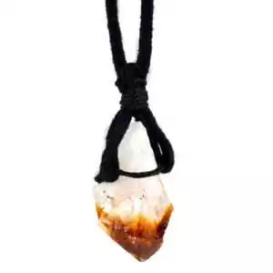 Natural yellow citrine crystal pendant on an adjustable waxed cord necklace displayed on a white background