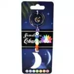 Crescent moon charm keychain with a strand of seven multicolored chakra stones on a metal ring displayed on a white background