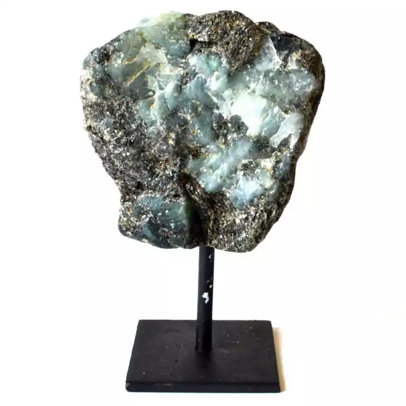 Raw natural emerald crystal mounted on a matte black display stand, showing green mineral cluster with visible crystalline structure on a neutral background