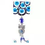 Owl evil eye keychain with blue nazar bead and decorative owl charm on a metal split ring displayed on a white background