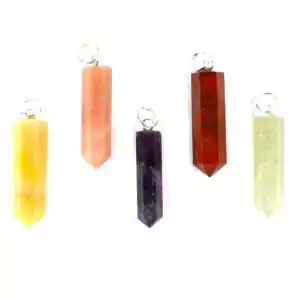 Set of twelve mixed crystal pencil point pendants in assorted stone varieties including amethyst, rose quartz, and citrine displayed together on a white background