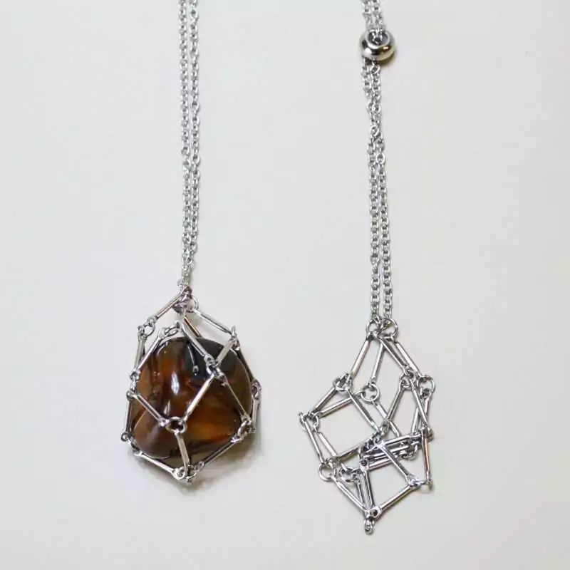 set-of-4-24quot-Stainless-chain-W-cage-for-stone-JC157 Set of four 24-inch stainless steel chain necklaces each with an open wire stone cage pendant displayed on a white background