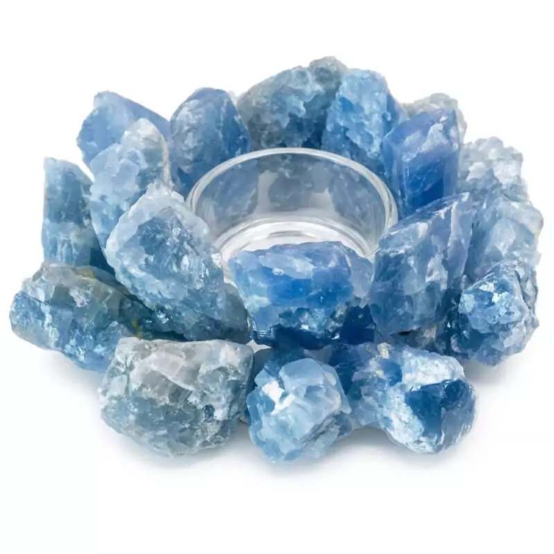 4-12quot-Blue-Cacite-tealight-holder-CH005_Z A 4.5-inch carved blue calcite tealight candle holder showing pale sky-blue coloring with natural white veining and a circular hollowed center for the tealight