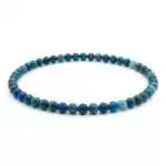 4mm apatite beaded stretch bracelet with vivid teal-blue round beads on elastic cord, shown on plain white surface