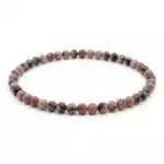 4mm rhodonite beaded stretch bracelet with rose-pink and black-veined round beads on elastic cord, shown on neutral surface