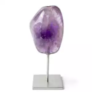 Natural purple amethyst crystal cluster mounted on a decorative silver-toned stand, displaying deep violet crystal points against a white background