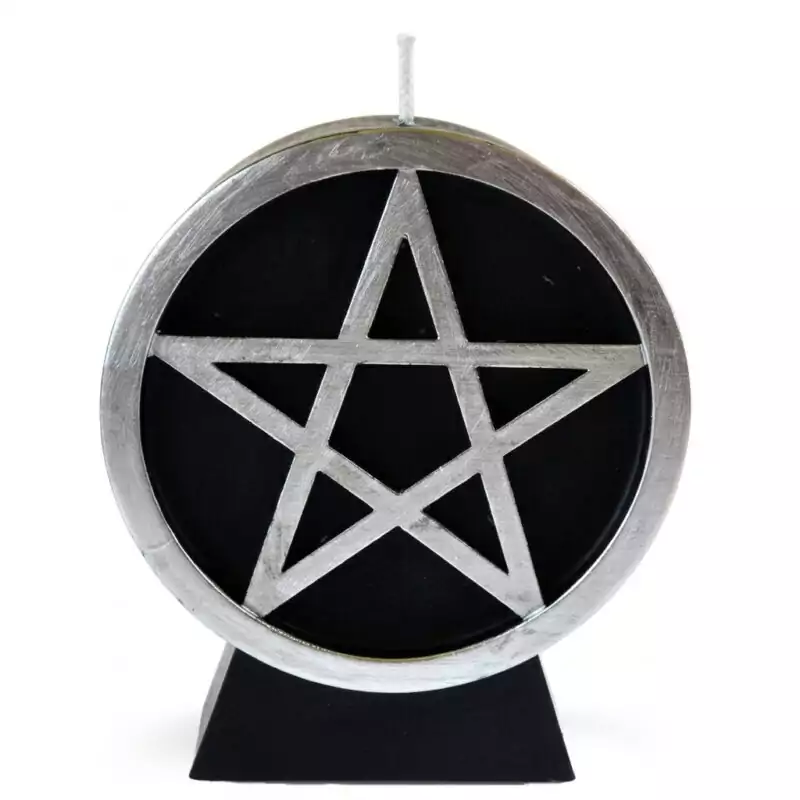 Black-Pentacle-candle-CPENBK_Z A black wax pentacle figure candle showing a five-pointed star in a circle molded onto the front face of the candle, set against a plain background