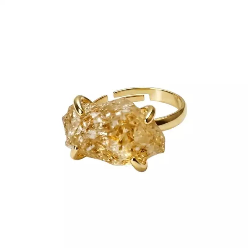 Citrine-adjustable-ring-JR024_Z Citrine adjustable crystal ring with a warm yellow stone set on an open gold-toned band displayed on a white background