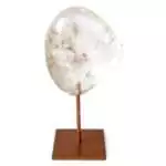 Clear quartz crystal specimen with visible transparent points mounted on a warm copper-toned display stand on a white background
