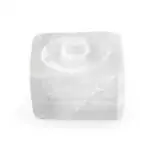 Small natural white selenite ring stand carved to cradle a gazing crystal sphere, showing fibrous pearlescent selenite texture on plain background