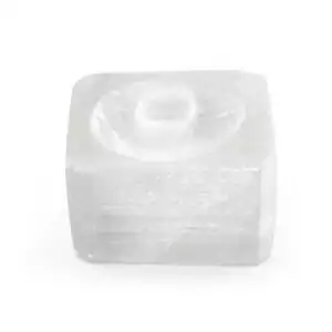 Small natural white selenite ring stand carved to cradle a gazing crystal sphere, showing fibrous pearlescent selenite texture on plain background