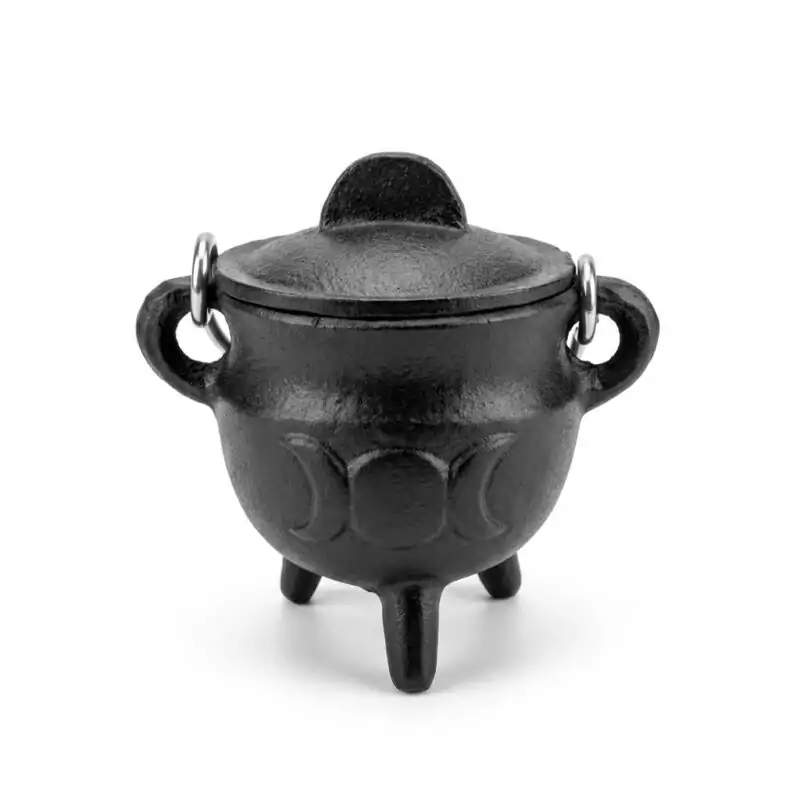 Triple-Moon-Cast-Iron-Cauldron-w-Lid-2-34quot-ICBR84_Z 2.75-inch black cast iron cauldron with triple moon crescent relief on the body and a fitted lid, three-legged base, shown on neutral background