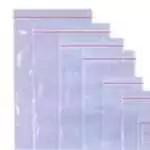 Clear zip-top poly bags fanned to show the red-stripe zip seal, representing the 3 by 4 inch size sold as a 100-pack for herb sachets and spell ingredient storage.