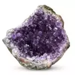A flat-cut Uruguayan amethyst geode standing upright, showing a deep purple crystal interior with naturally formed crystal point clusters radiating from the center of the geode cavity, against a white background.