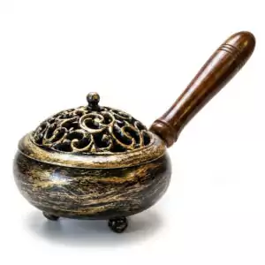 9-inch metal incense burner with antiqued golden finish, intricate swirling pattern on the decorative metal top, and wooden handle — compact charcoal and resin censer for ritual space clearing and altar use.