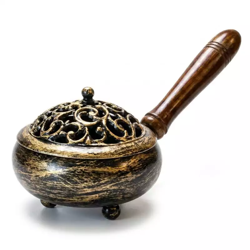 9quot-metal-incense-burner-IBR63_Z 9-inch metal incense burner with antiqued golden finish, intricate swirling pattern on the decorative metal top, and wooden handle — compact charcoal and resin censer for ritual space clearing and altar use.
