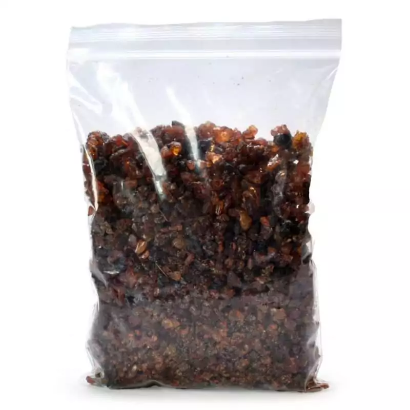 Sealed clear plastic bag filled with reddish-brown and dark myrrh resin tears, showing a full 1 pound bulk quantity of granular incense.