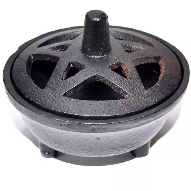 3-38quot-Cast-Iron-Pentagram-cauldron-ICBR56 Small black cast iron cauldron on short feet with a raised five-pointed pentagram star cutout in the lid, allowing smoke to rise through the star shape.