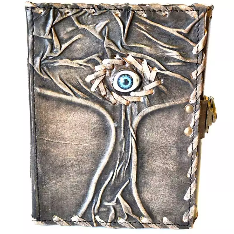 5 by 7 inch handcrafted leather journal embossed with Tree of Life and Evil Eye design, latch closure